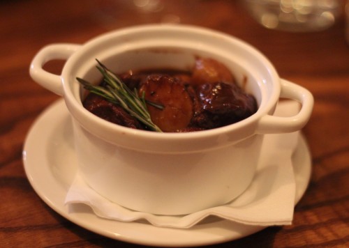 Iberian pork cheeks braised with chestnuts and chocolate sauce