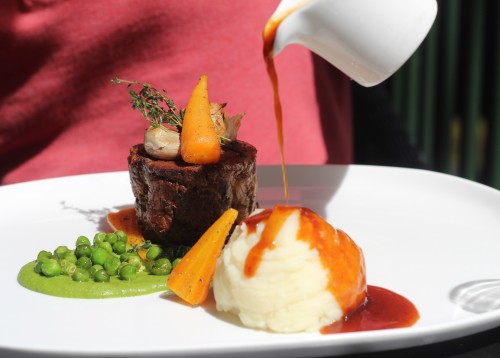 9 hour braised lamb shoulder, cacao balsamic glaze, new season pea puree and cacao garlic mash