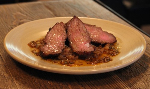 Acorn-fed Iberico presa, caramelised onion & pincho moruno salsa