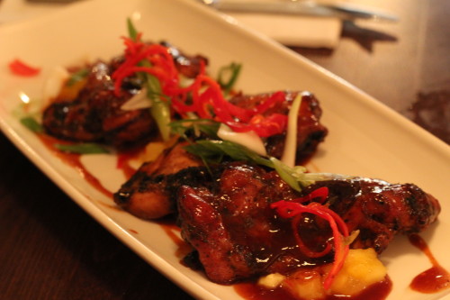 Barbecued chicken pieces Smothered with spiced barbecue sauce, pineapple mango chilli salsa