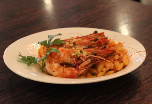 King prawns with cannellini beans, pancetta and rosemary