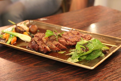Hibatchi Steak - Sliced, Grilled Ribeye with sweet soy sauce, sesmae and onion garnsih served with seasonal veg