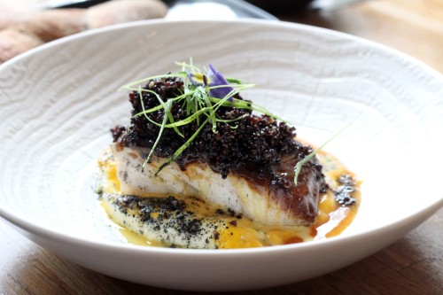 Roast cod, black quinoa and orange reduction