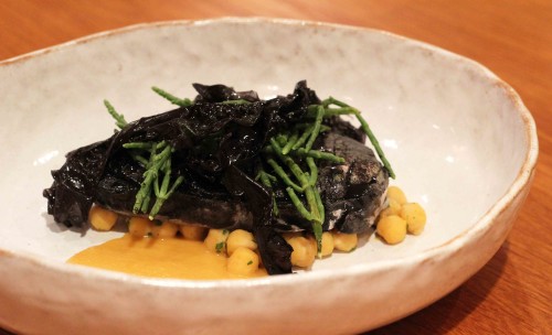 Ink poached pollock, chickpea & harissa