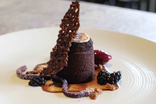 Warm chocolate pudding, berries & blackcurrant sorbet