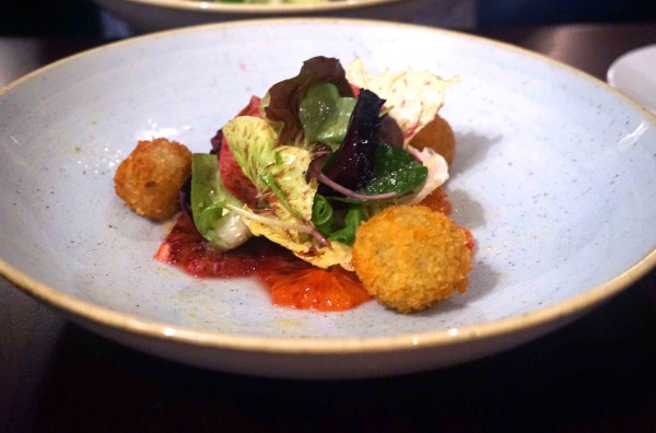 The Black Swan Ockham Blood orange, radicchio & blue vinny bon bons, citrus dressing
